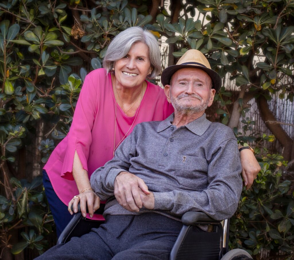 Portrait of a smiling elderly couple looking at camera